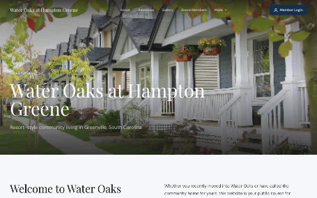 The Water Oaks at Hampton Greene website on a desktop browser at wateroakshoa.com, built with Communitrak